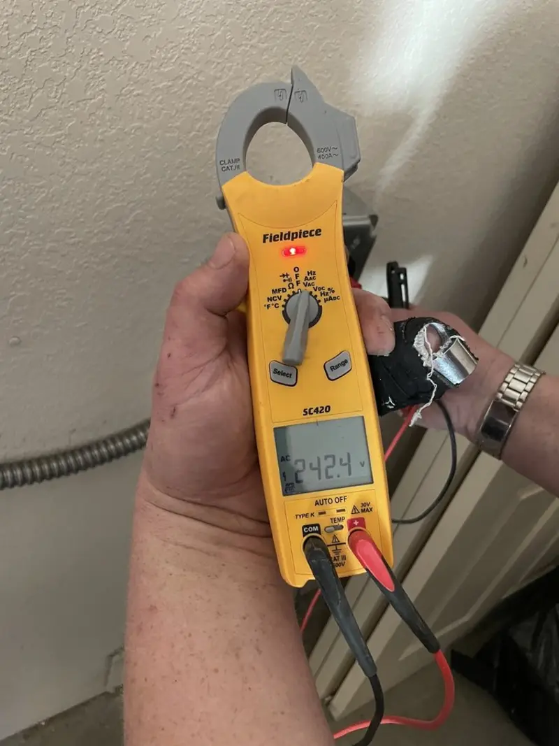 Voltage testing with clamp meter during Aluminum Wiring Replacement in Huntersville